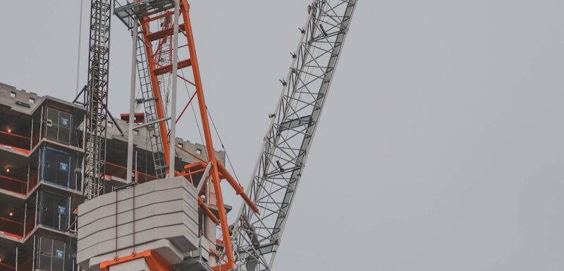 a crane that is on top of a building